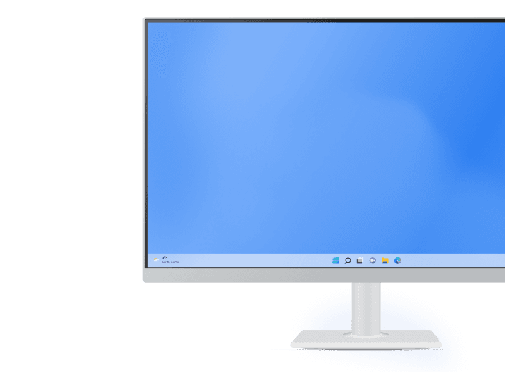 Close-up of a monitor displaying a Windows desktop with a bright blue background.