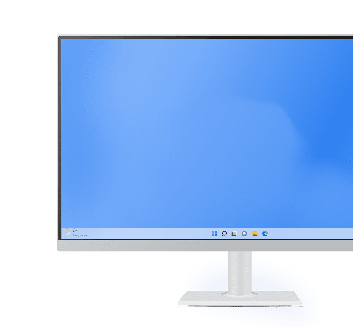 Close-up of a monitor displaying a Windows desktop with a bright blue background.